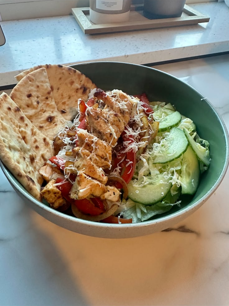 Chicken, chips and salad with flatbread